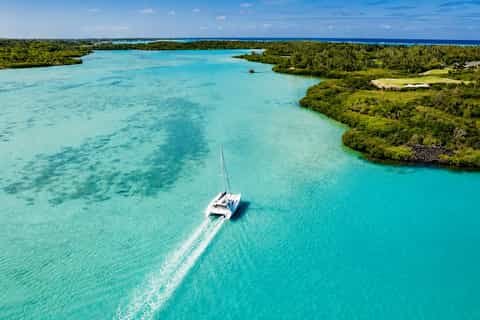 Catamaran sailing near Île aux Cerfs, Mauritius