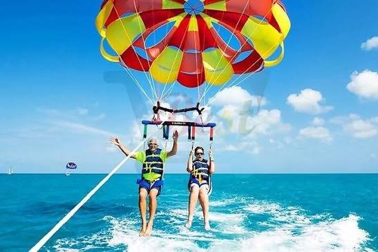 Parasailing above the lagoon at Île aux Cerfs