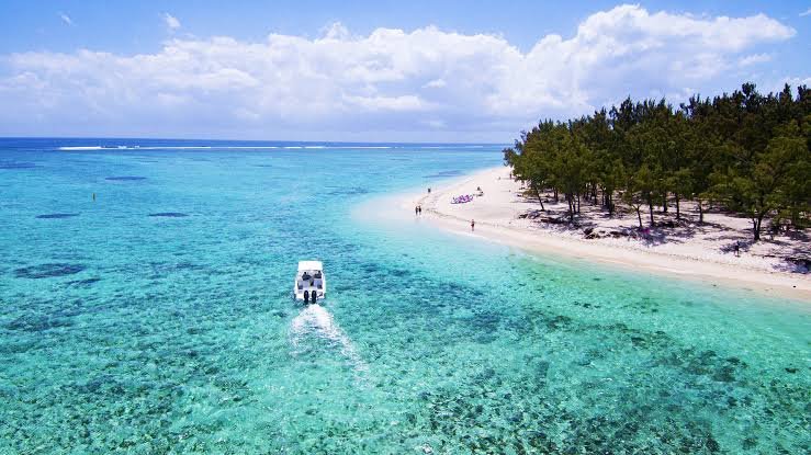 Visitors exploring Île aux Cerfs, Mauritius